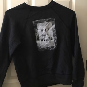 Black crewneck sweatshirt